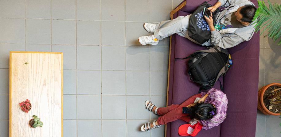 students sitting on couch